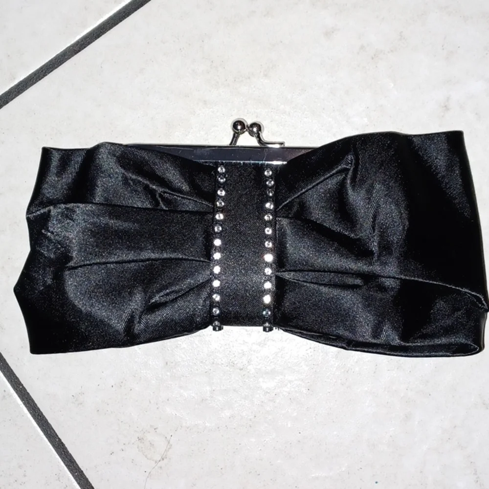 Claire’s Black Evening Clutch or Handbag